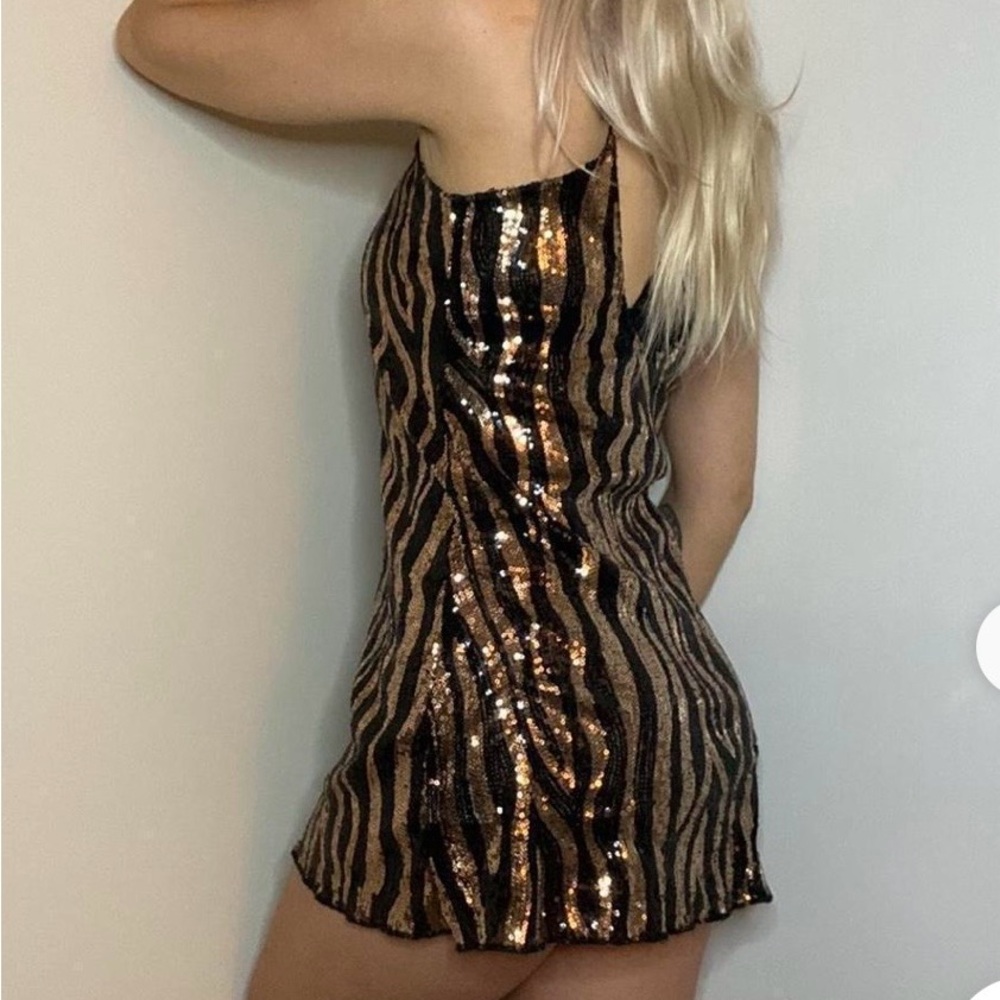 Shasa Black and Gold Backless Dress